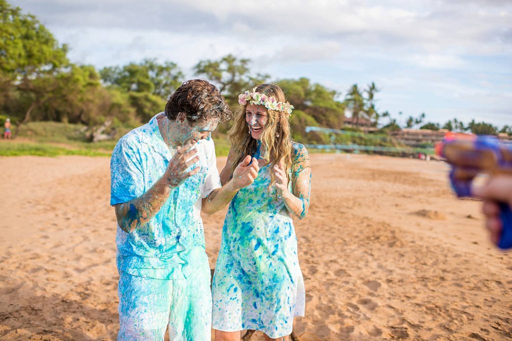 Cute-gender-reveal-ideas-Maui-Photographer_0012 - Ann Arbor Wedding Photographer Angela Nelson Photography Couple covered in blue powder at gender reveal
