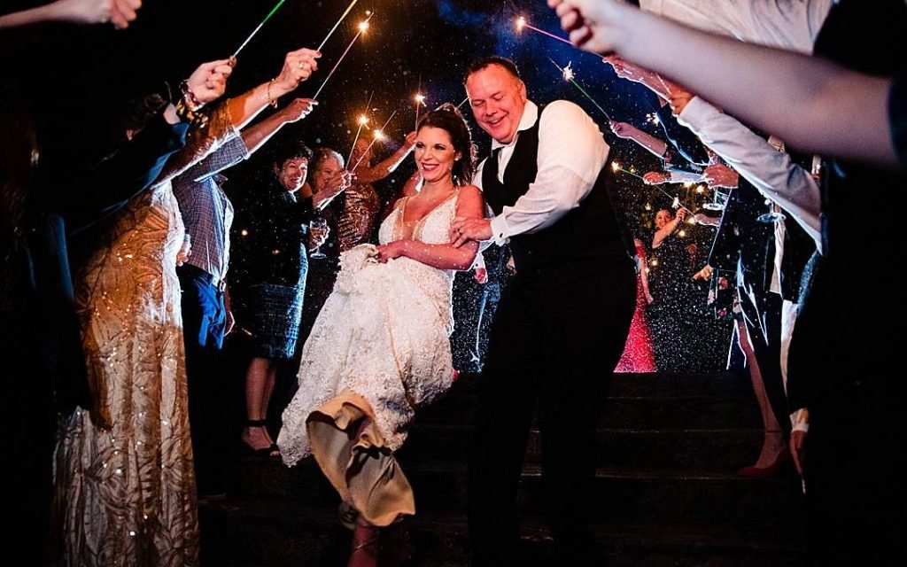 New-Years-Eve-Candlelit-Wedding_0025-1080x675_5d964995991da50565ab04145e41e724 - Ann Arbor Wedding Photographer Angela Nelson Photography Bride and groom with sparklers